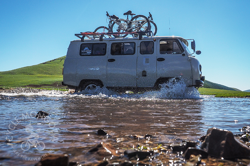 Crossing river with Russian van - most durable and reliable vehicle in Mongolian wilderness